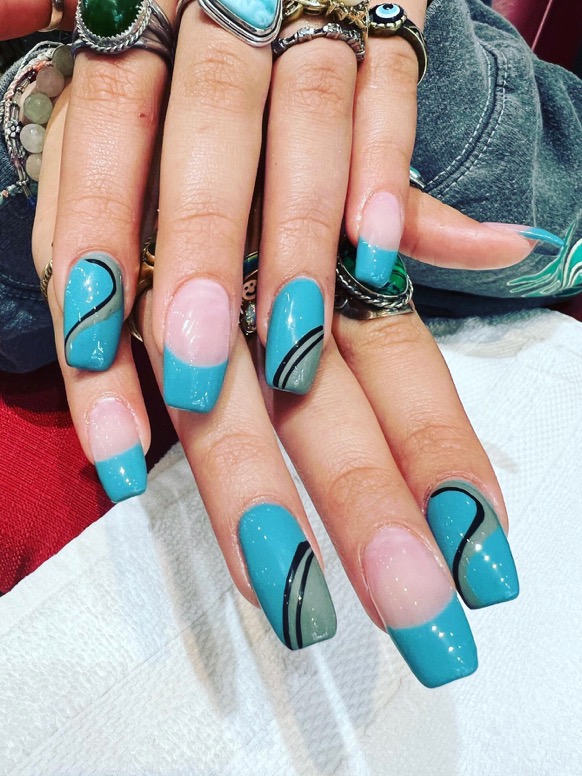 Bold teal acrylic with swirl design